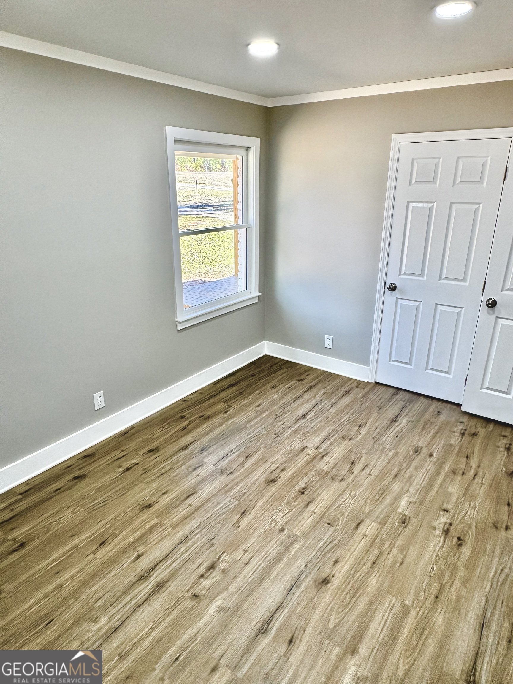 56 John Lovelace Road LaGrange, GA 30241 - Photo 18 of 26 wooden floor in an empty room