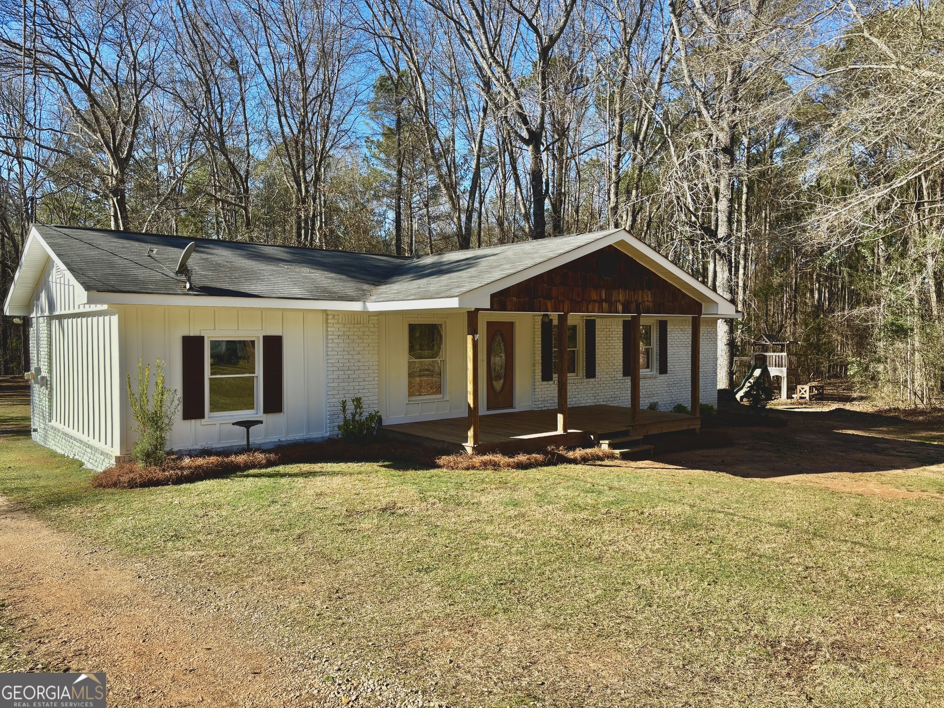 56 John Lovelace Road LaGrange, GA 30241 - Photo 2 of 26 a front view of a house with yard