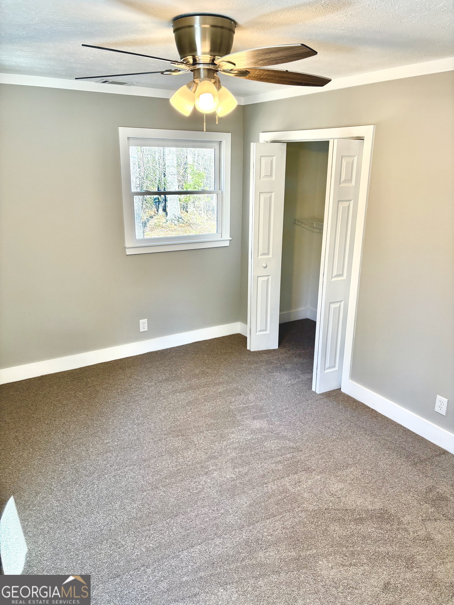 56 John Lovelace Road LaGrange, GA 30241 - Photo 25 of 26 a view of an empty room with a window