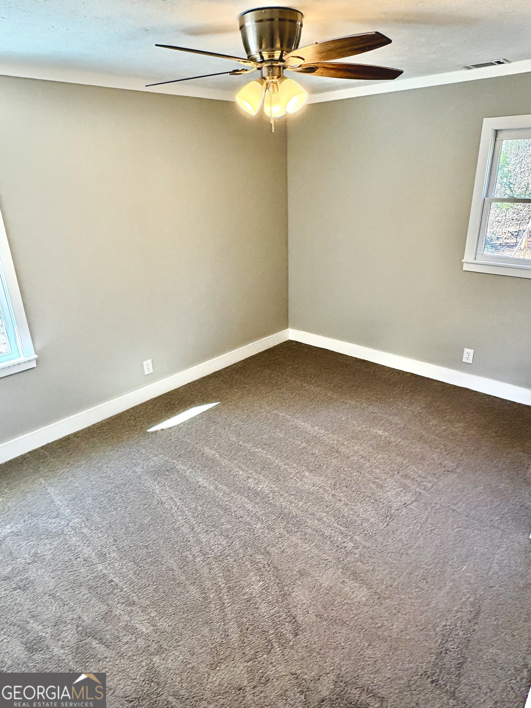56 John Lovelace Road LaGrange, GA 30241 - Photo 26 of 26 a view of an empty room with a window