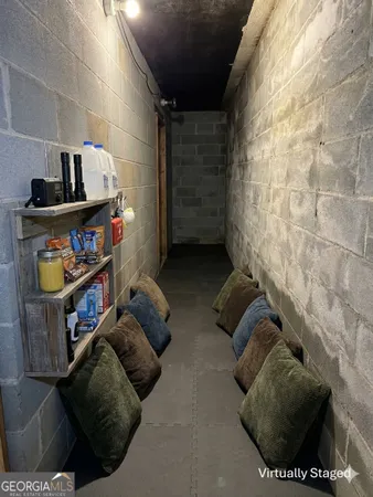 a view of a livingroom with an empty space and window