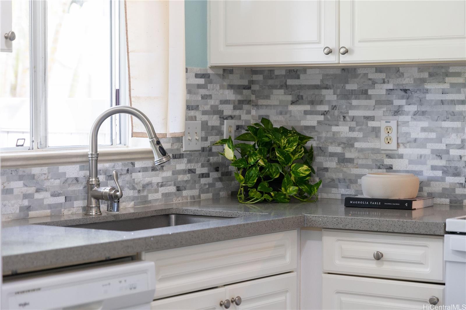 95-971 Wikao Street, Unit 11 Mililani, HI 96789 - Photo 12 of 24 a close view of sink and tap