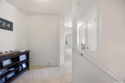 a view of room with cabinet and closet