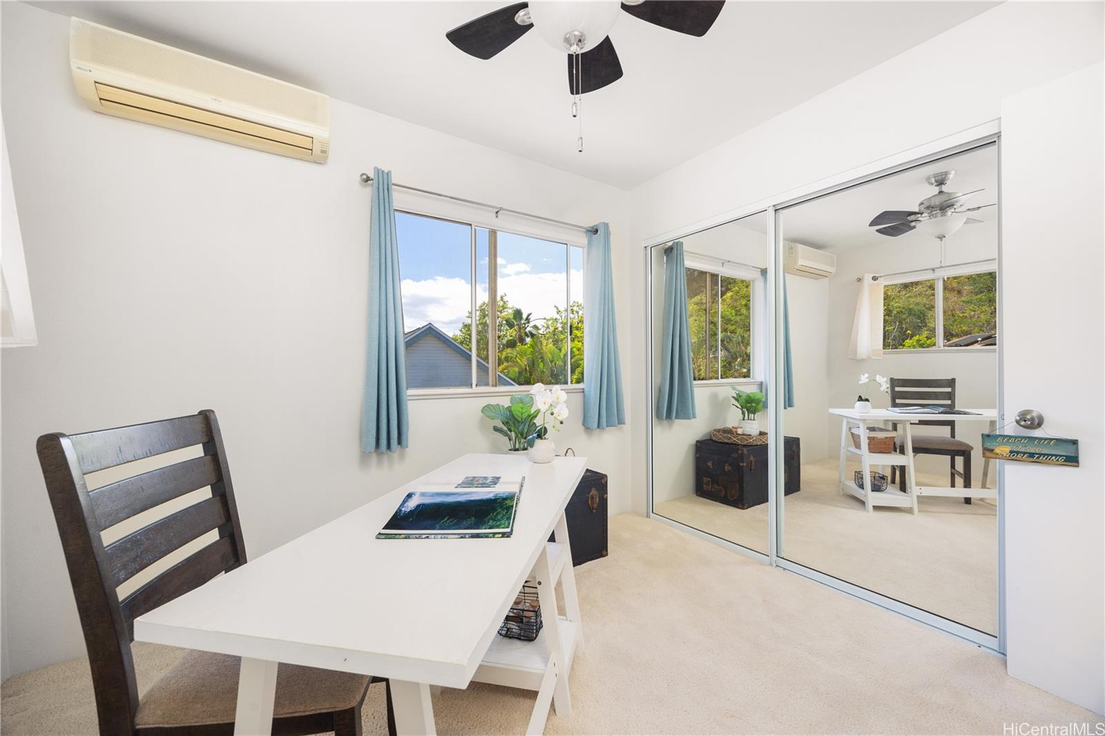 95-971 Wikao Street, Unit 11 Mililani, HI 96789 - Photo 21 of 24 a view of a dining room with furniture window and outside view