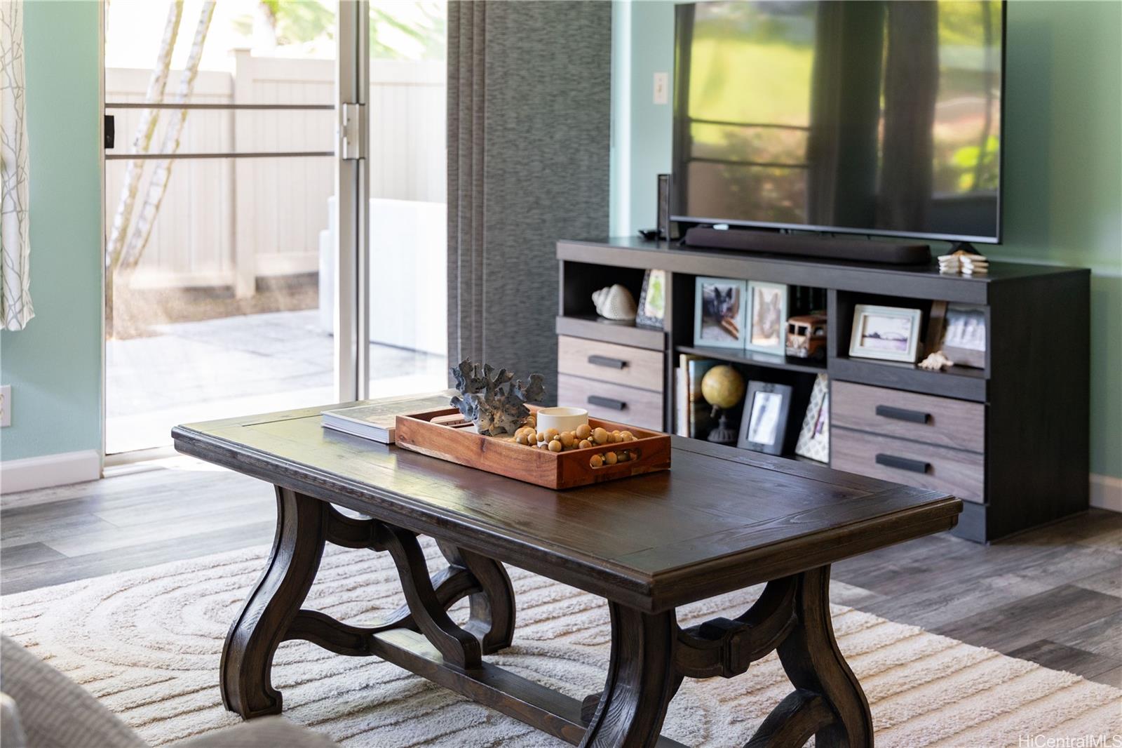 95-971 Wikao Street, Unit 11 Mililani, HI 96789 - Photo 7 of 24 a view of a workspace with furniture and window