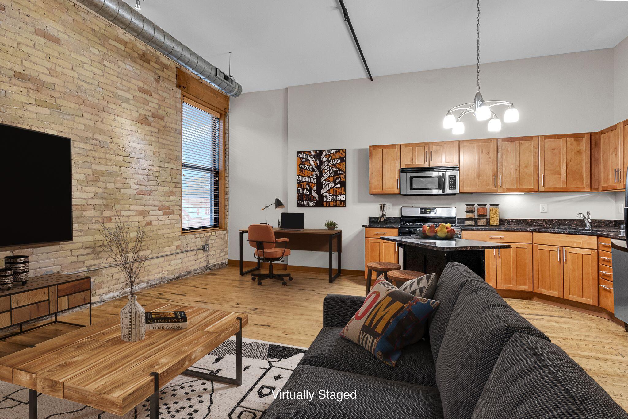 1017 South 2nd Street, Unit 303 Milwaukee, WI 53204 - Photo 1 of 1 Virtually staged picture to show possible furniture arrangement
