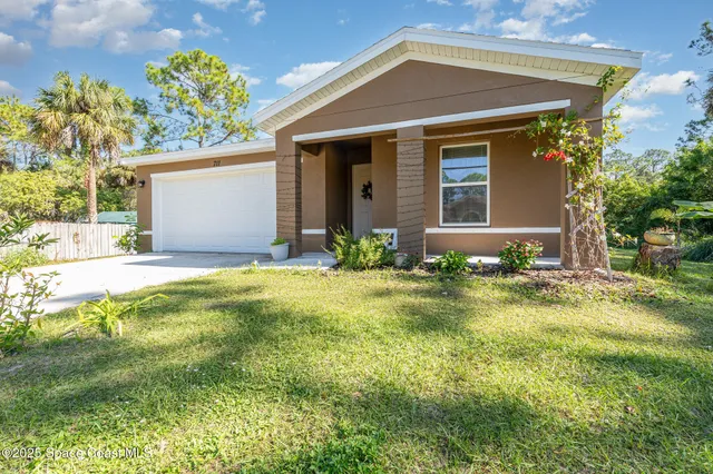 a front view of house with yard