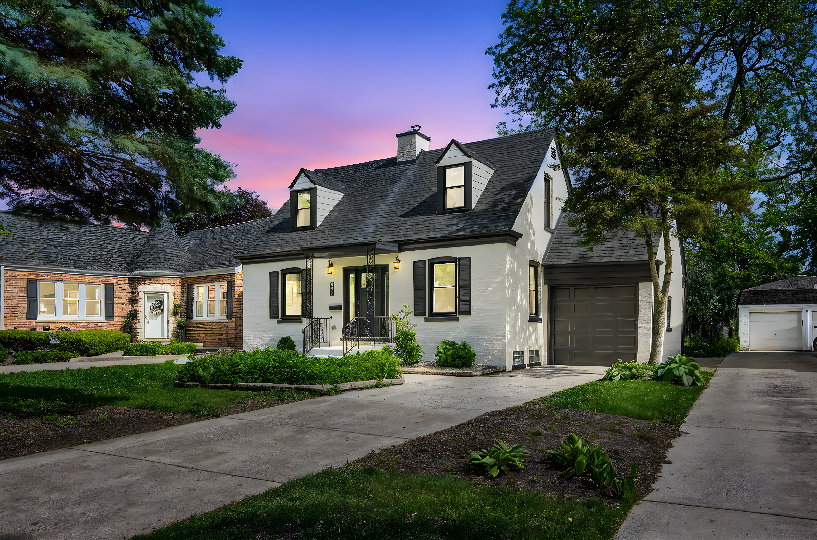 327 Southcote Road Riverside, IL 60546 - Photo 1 of 35 a front view of a house with a garden and plants