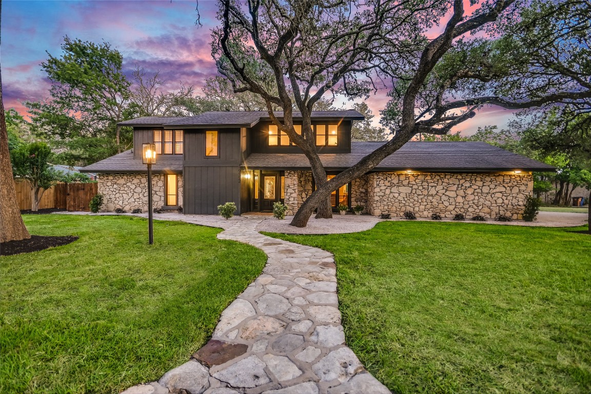 a view of a big yard next to a house