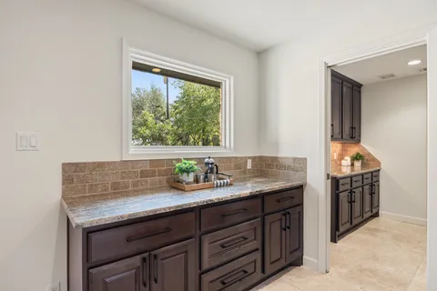 a view of cabinets with wooden floor