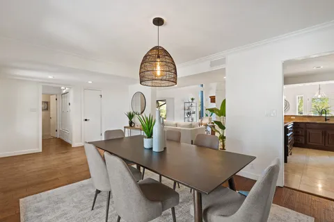 a view of a dining room with furniture