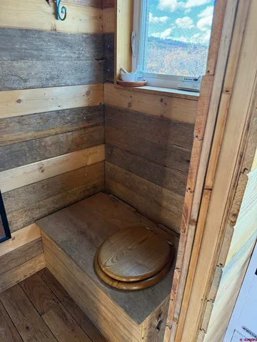 a bathroom with a toilet and a sink