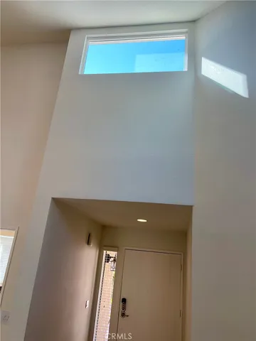 a view of a livingroom with furniture and windows