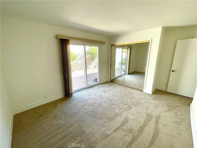 a view of bathroom with mirror and a sink