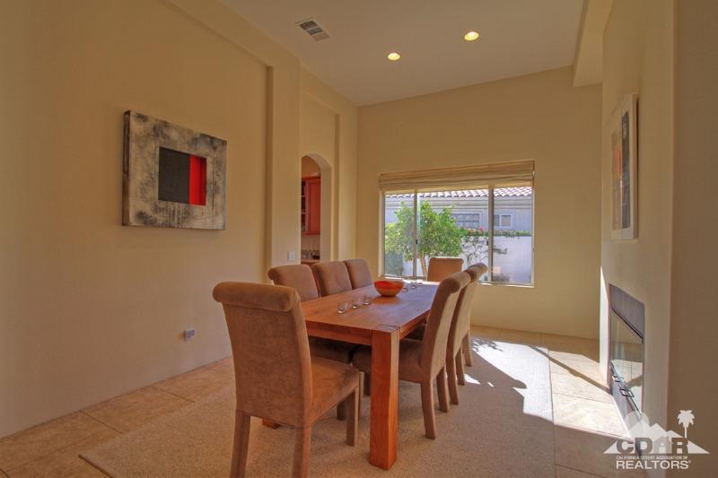 316 Loch Lomond Road Rancho Mirage, CA 92270 - Photo 20 of 37 a dining room with furniture and a floor to ceiling window