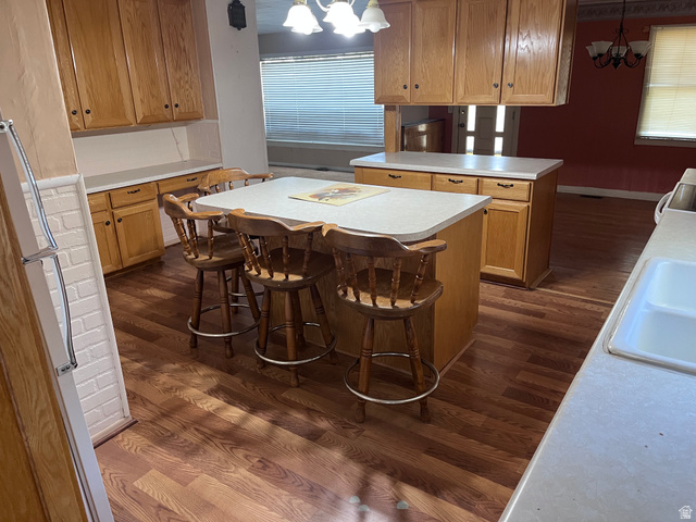 1766 Pine Rd Pine Canyon Tooele, UT 84074 - Photo 7 of 16 Kitchen featuring wood-finish flooring and oak cabinetry