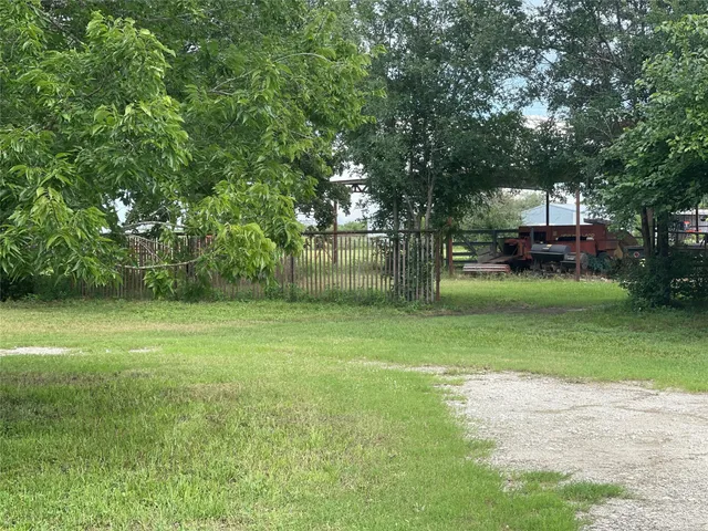 a view of a lake with a house in the background