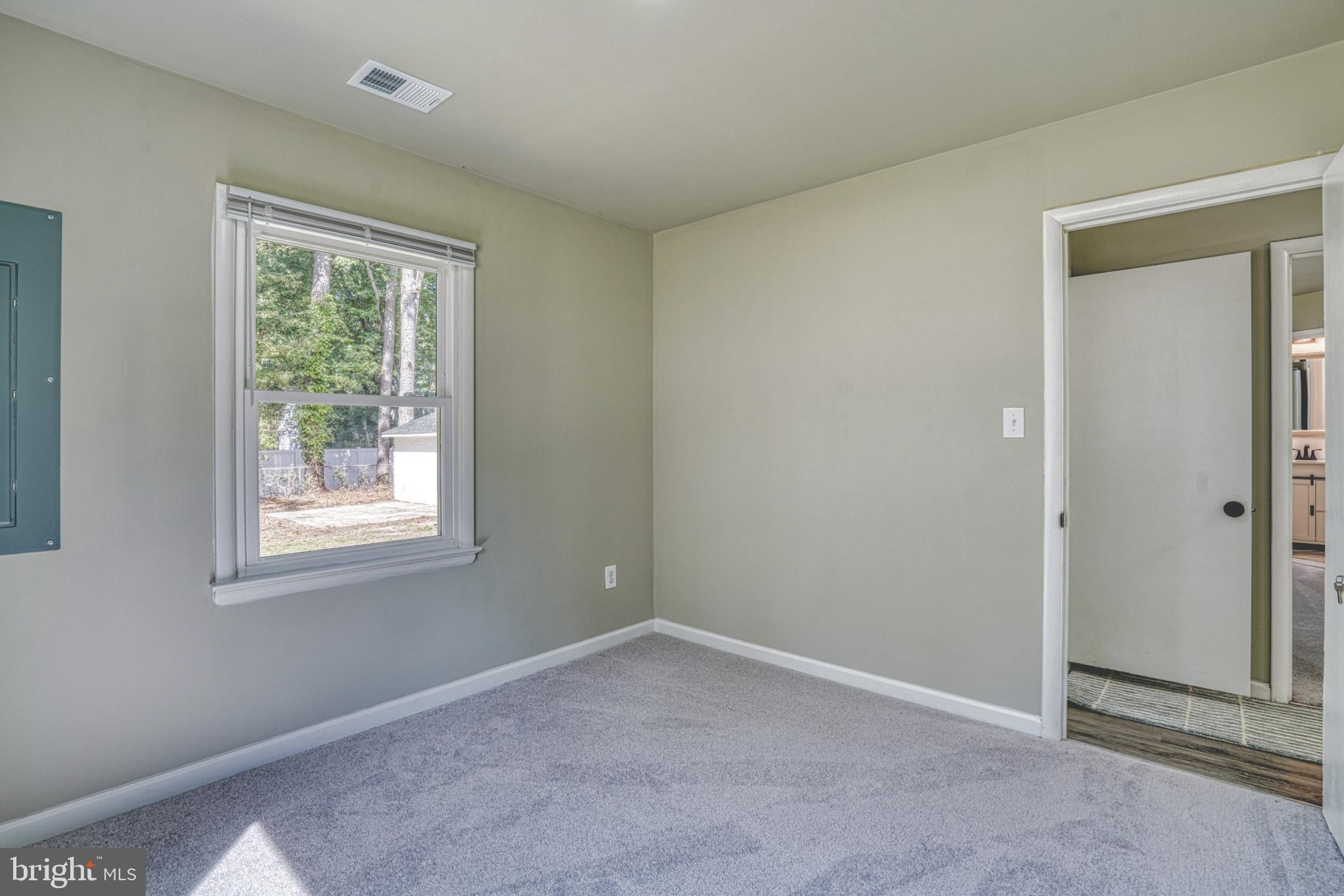 607 Edlon Park Cambridge, MD 21613 - Photo 28 of 34 a view of an empty room with a window