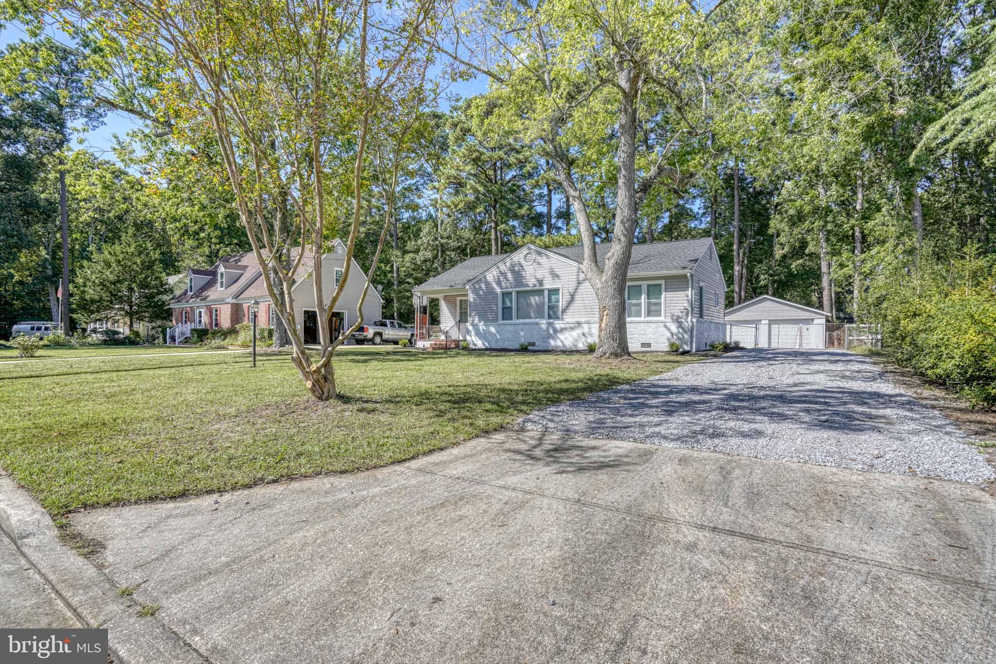 607 Edlon Park Cambridge, MD 21613 - Photo 3 of 34 a view of a house with a yard and tree s
