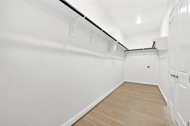 a view of a room with racks on the wall