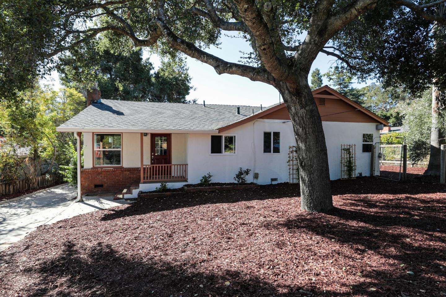 22620 Ricardo Road Cupertino, CA 95014 - Photo 1 of 34 a front view of a house with a yard