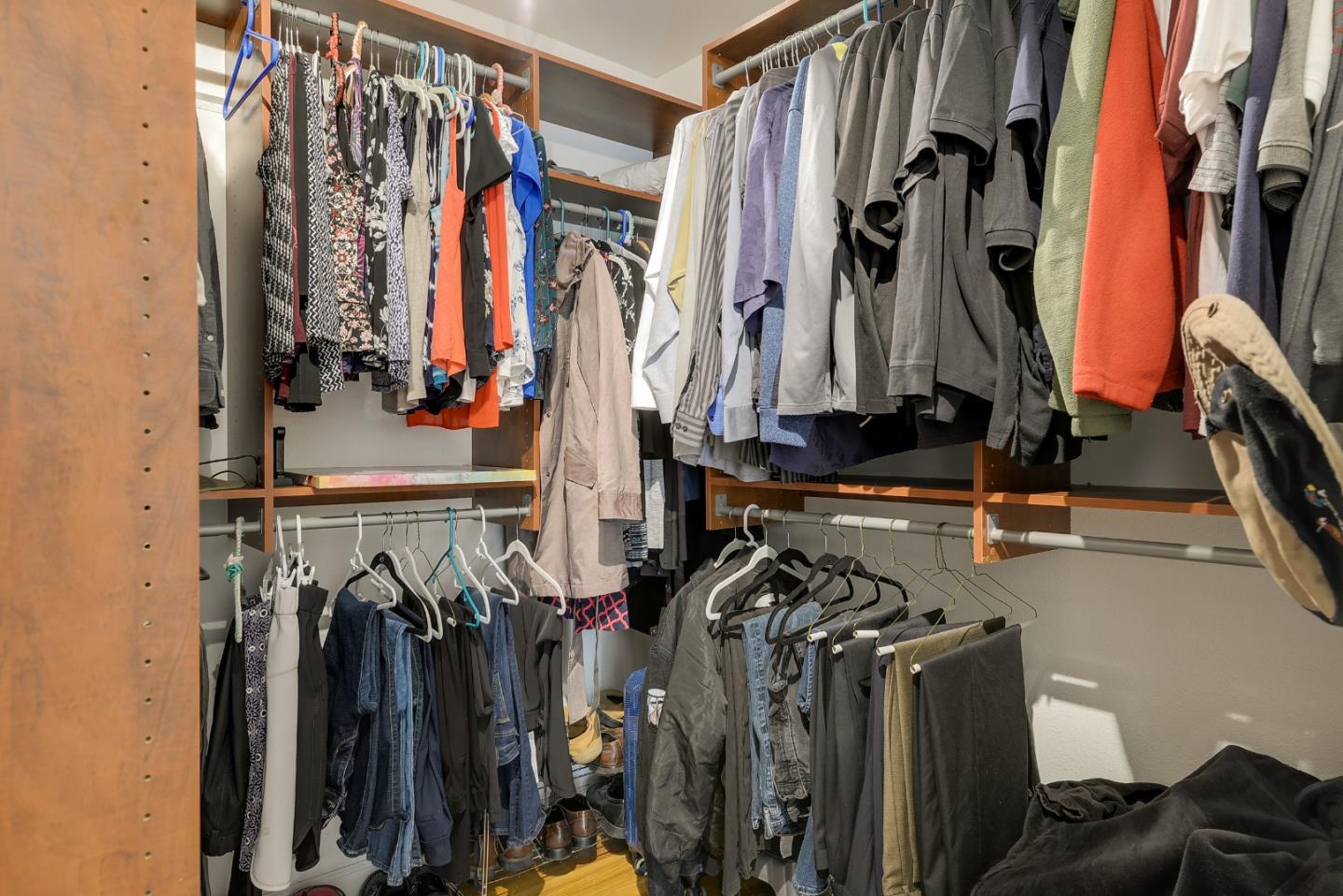 22620 Ricardo Road Cupertino, CA 95014 - Photo 17 of 34 a view of walk in closet with clothes