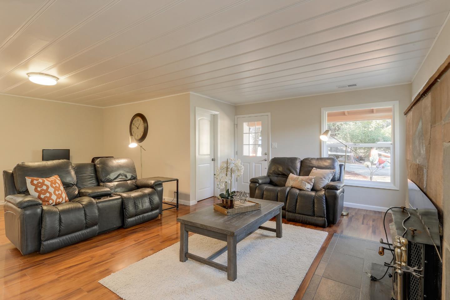 22620 Ricardo Road Cupertino, CA 95014 - Photo 2 of 34 a living room with furniture rug and window