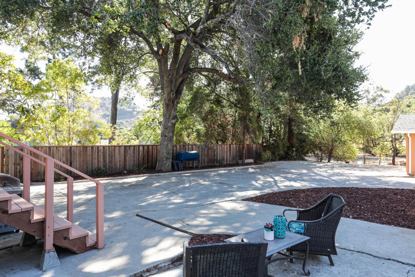 22620 Ricardo Road Cupertino, CA 95014 - Photo 24 of 34 a view of backyard with deck and seating space
