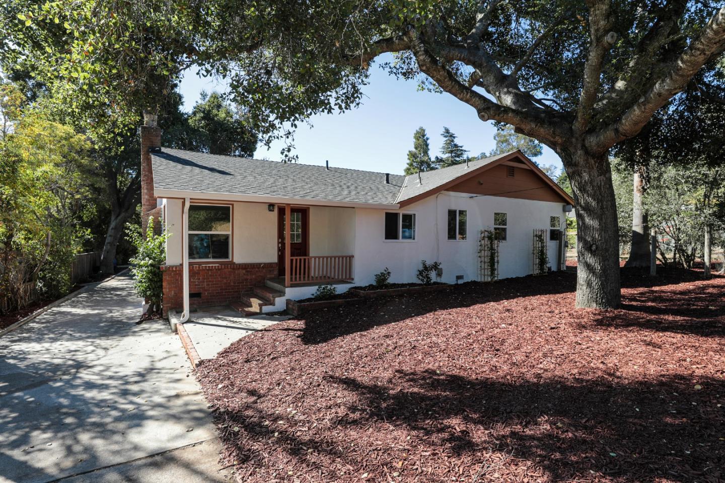 22620 Ricardo Road Cupertino, CA 95014 - Photo 27 of 34 a front view of a house with a yard