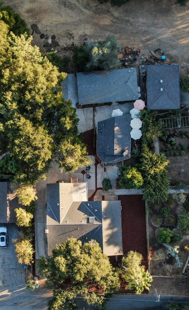 22620 Ricardo Road Cupertino, CA 95014 - Photo 29 of 34 front view of a house with a yard and potted plants