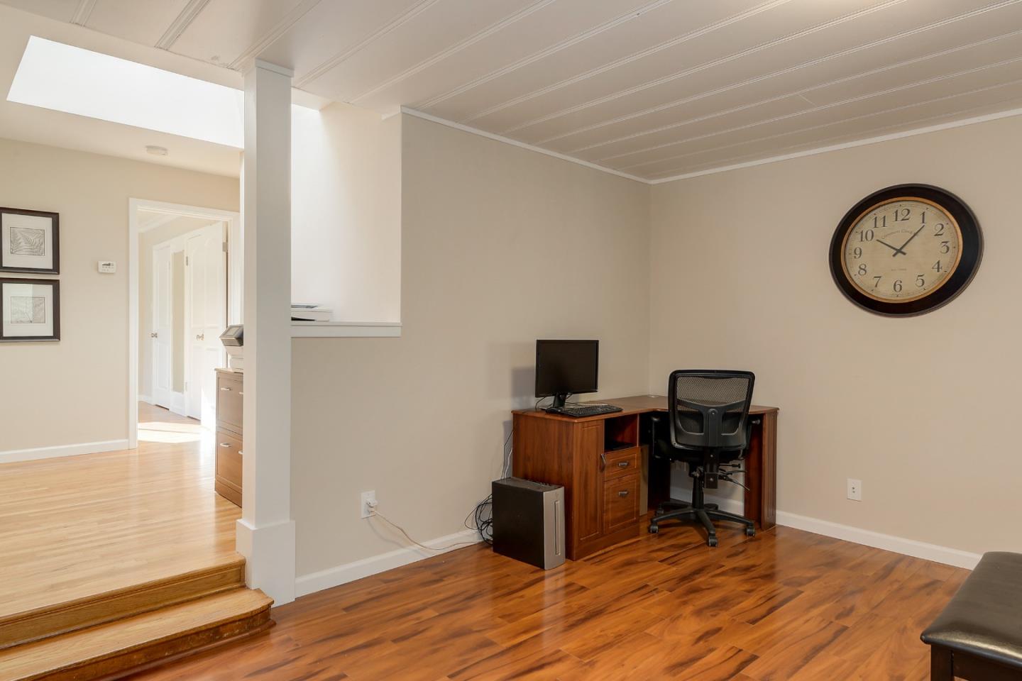 22620 Ricardo Road Cupertino, CA 95014 - Photo 7 of 34 a view of a workspace with furniture and wooden floor