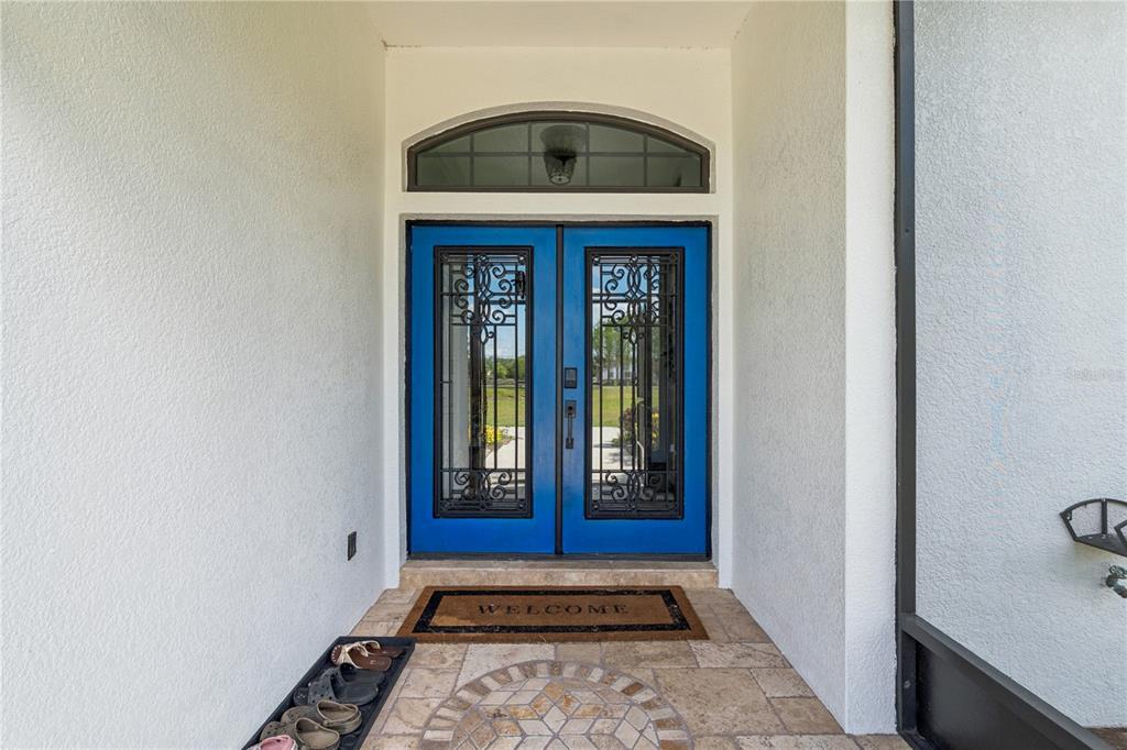 345 Cypress Isles Road Osteen, FL 32764 - Photo 7 of 41 a view of an entryway door