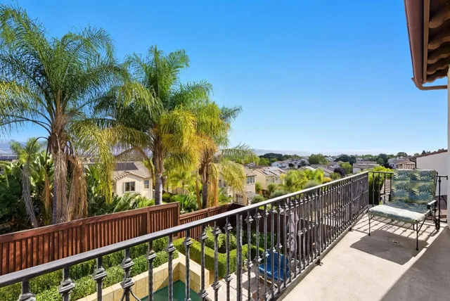 a view of balcony and wooden floor