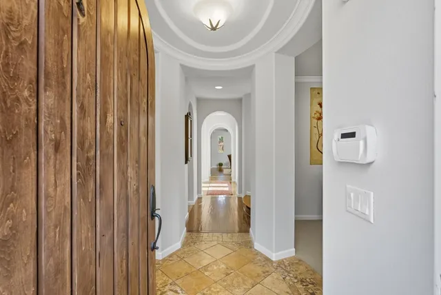 a view of a hallway view with staircase