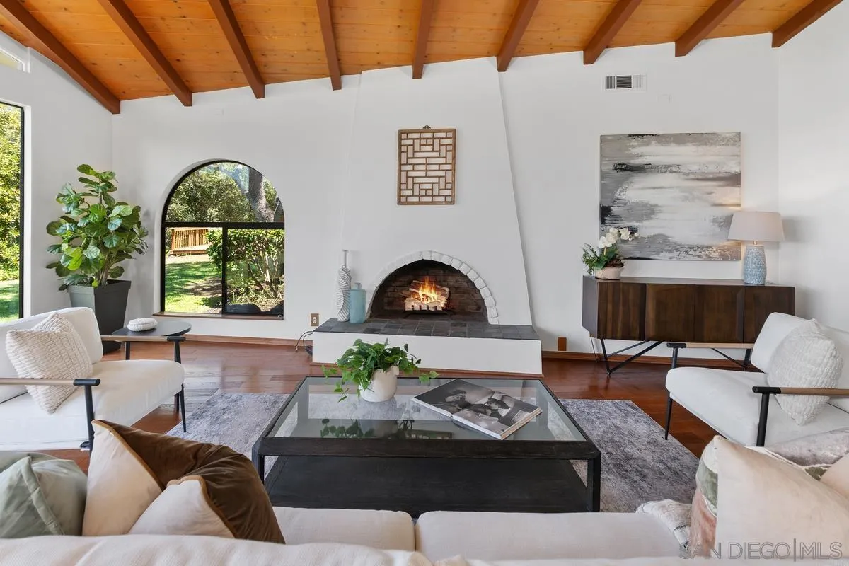 16269 Rostrata Hill Road Poway, CA 92064 - Photo 8 of 48 a living room with furniture and a large window