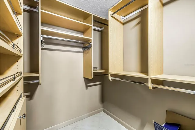 a bathroom with a toilet a sink and a mirror