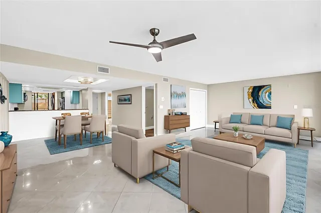 a living room with furniture and a window