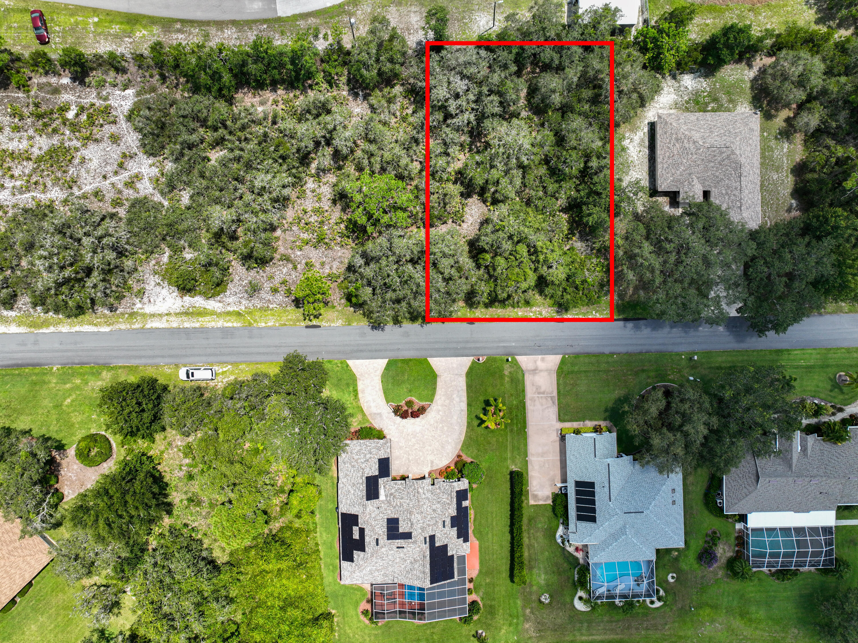 4411 Cremona Drive Sebring, FL 33872 - Photo 2 of 8 an aerial view of a house with a yard and garden