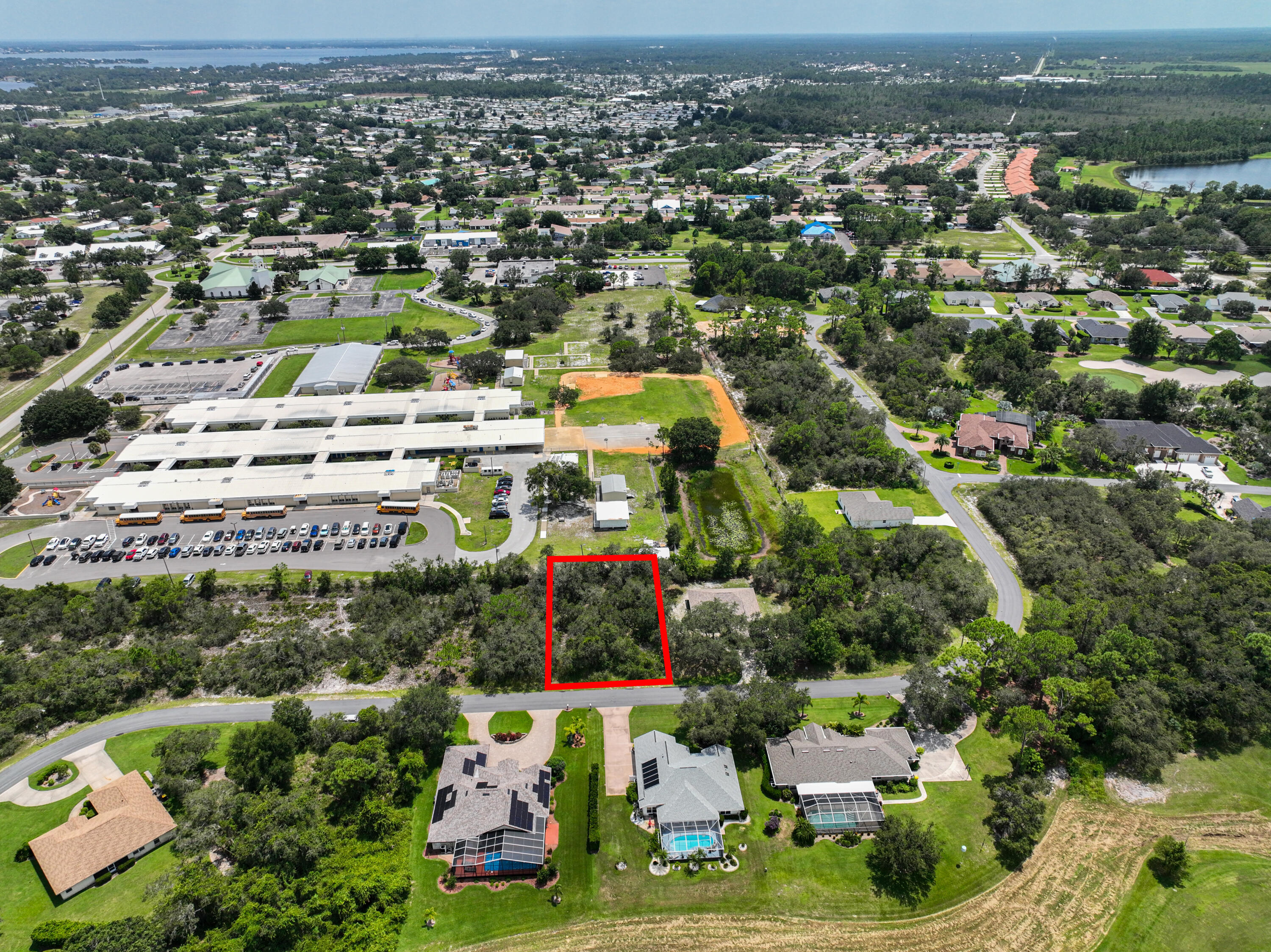 4411 Cremona Drive Sebring, FL 33872 - Photo 4 of 8 an aerial view of multiple house