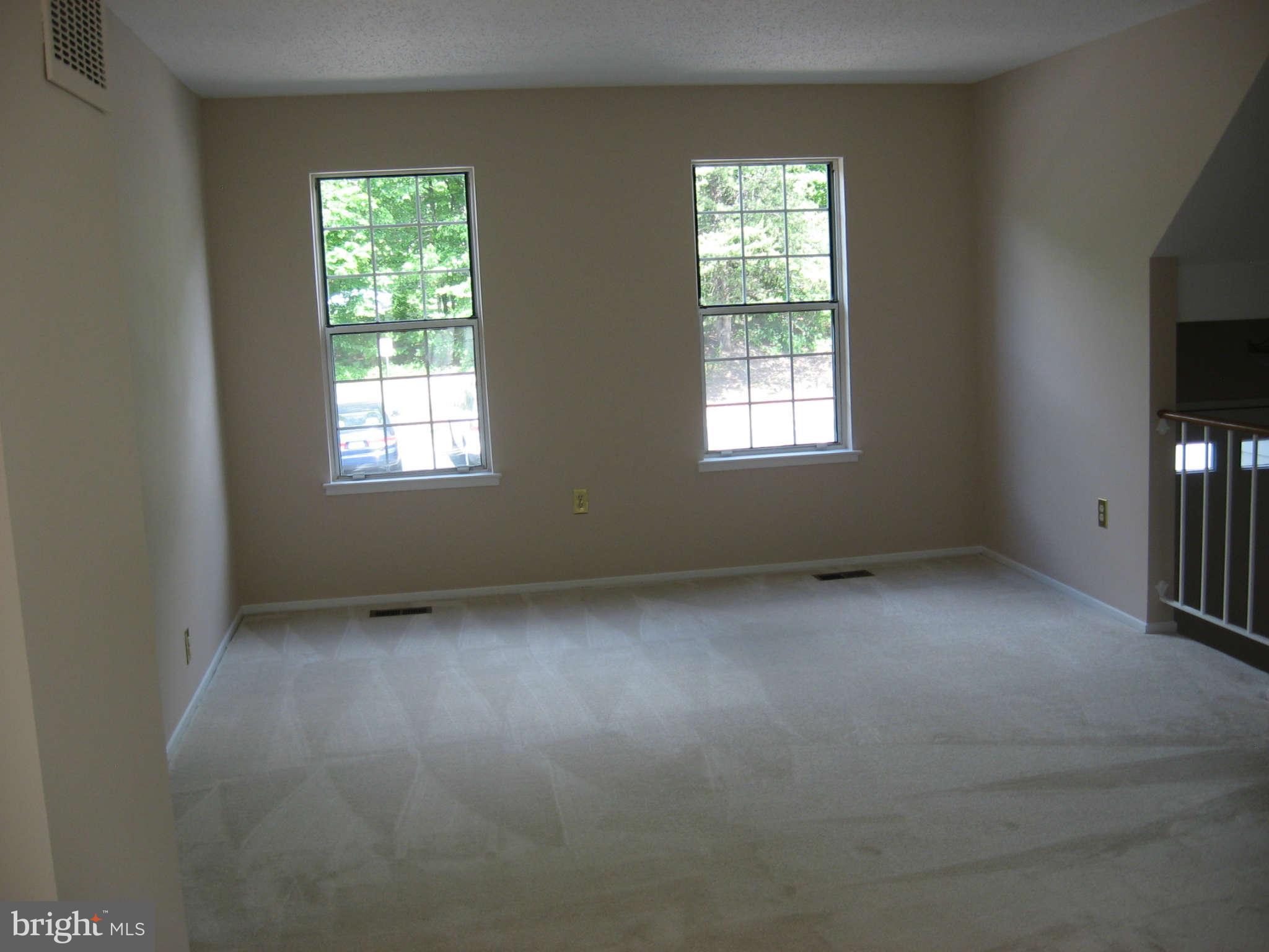 2356 Hunters Square Court, Unit 2356 Reston, VA 20191 - Photo 14 of 27 an empty room with a window