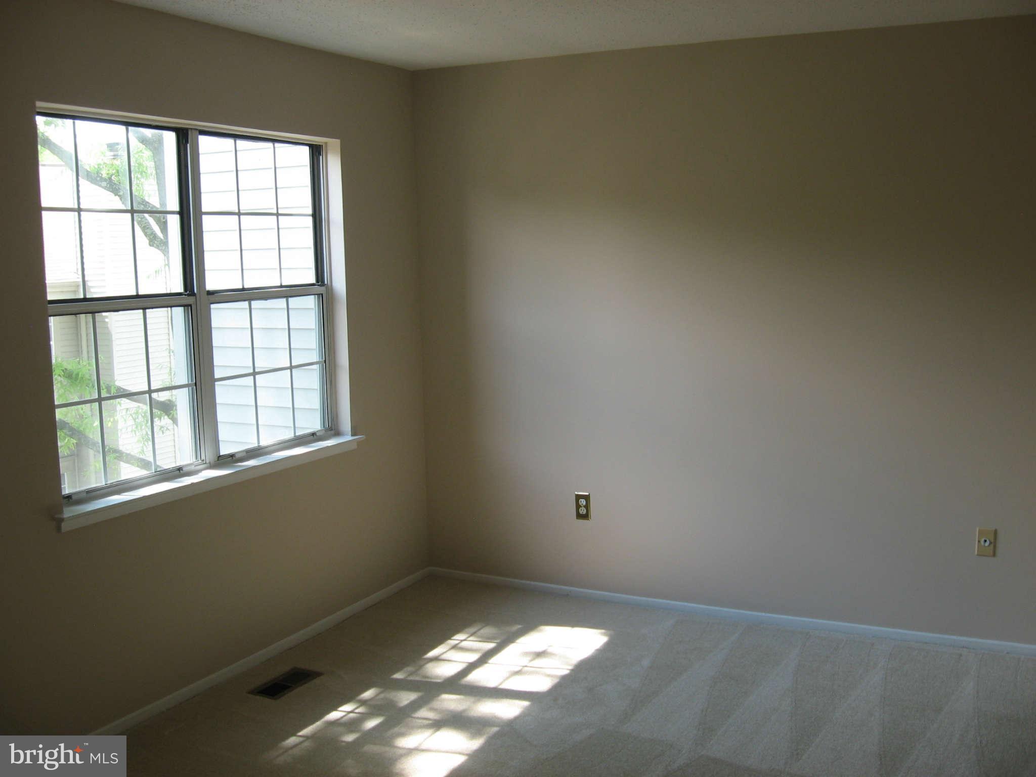 2356 Hunters Square Court, Unit 2356 Reston, VA 20191 - Photo 19 of 27 a view of an empty room and window