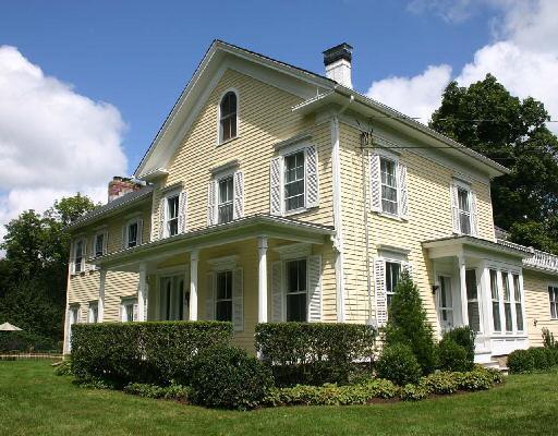2700 Redding Road Fairfield, CT 06824 - Photo 1 of 1 a front view of a house with a yard