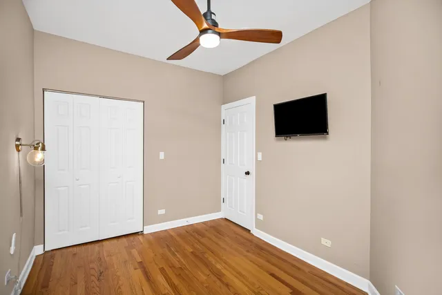 a view of a livingroom with wooden floor