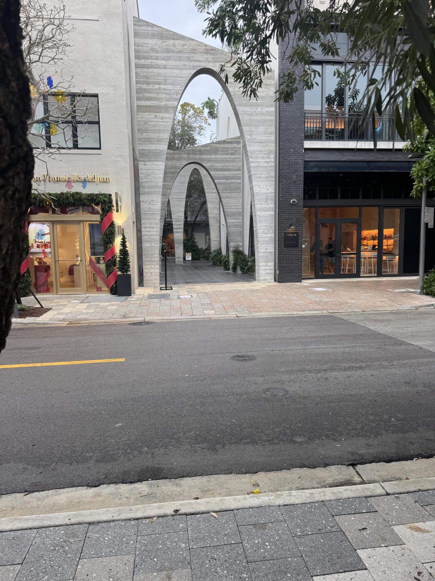 1017 Northwest 47th Street Miami, FL 33127 - Photo 16 of 18 a view of a building with car parked