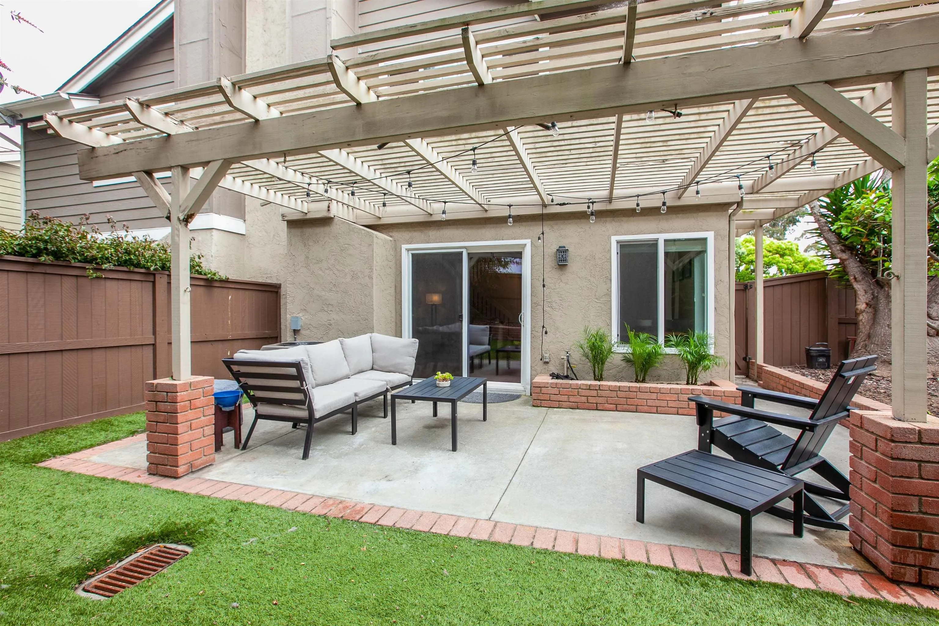 2952 Cape Cod Circle Carlsbad, CA 92010 - Photo 24 of 24 a backyard of a house with outdoor seating