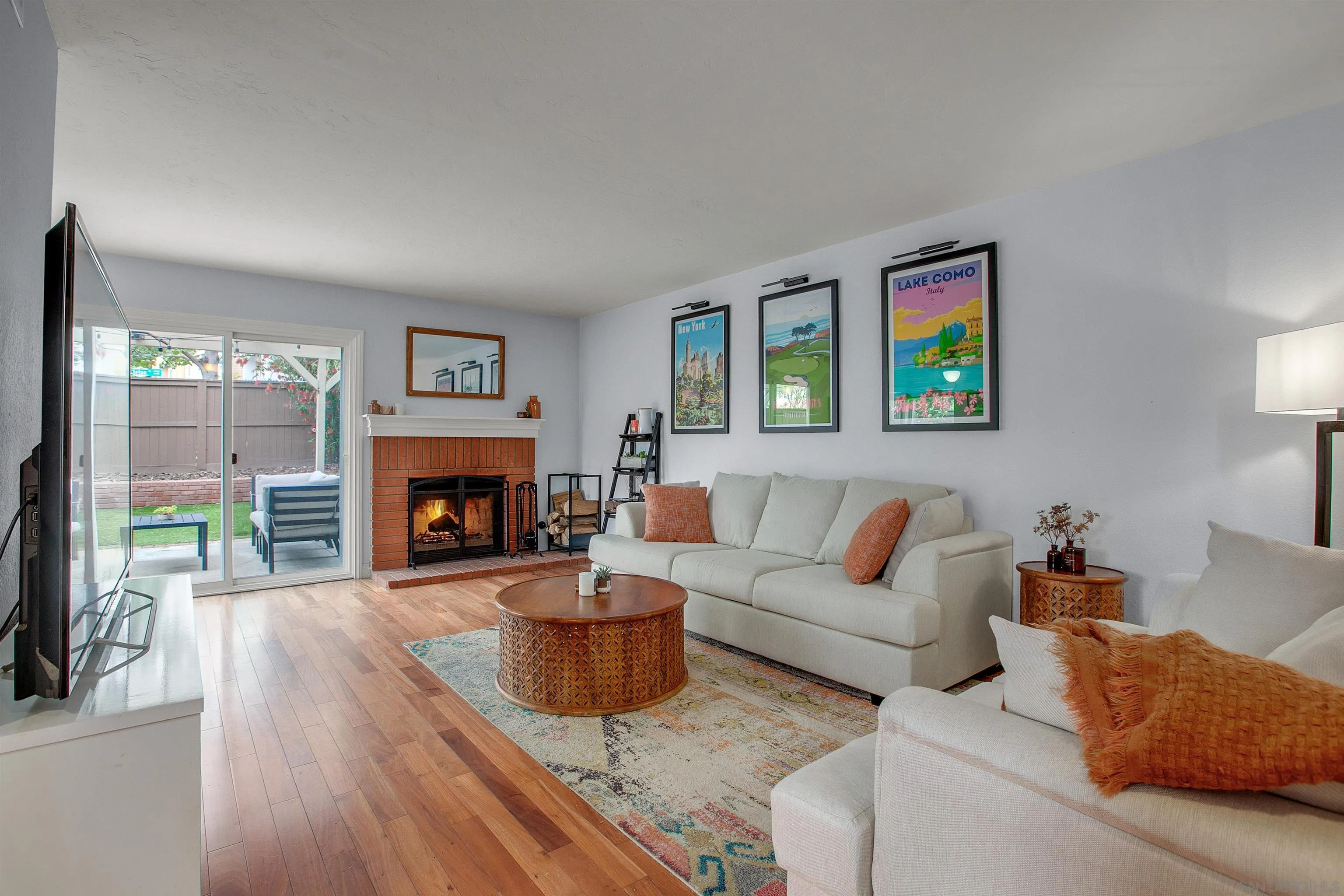 2952 Cape Cod Circle Carlsbad, CA 92010 - Photo 3 of 24 a living room with furniture and a fireplace