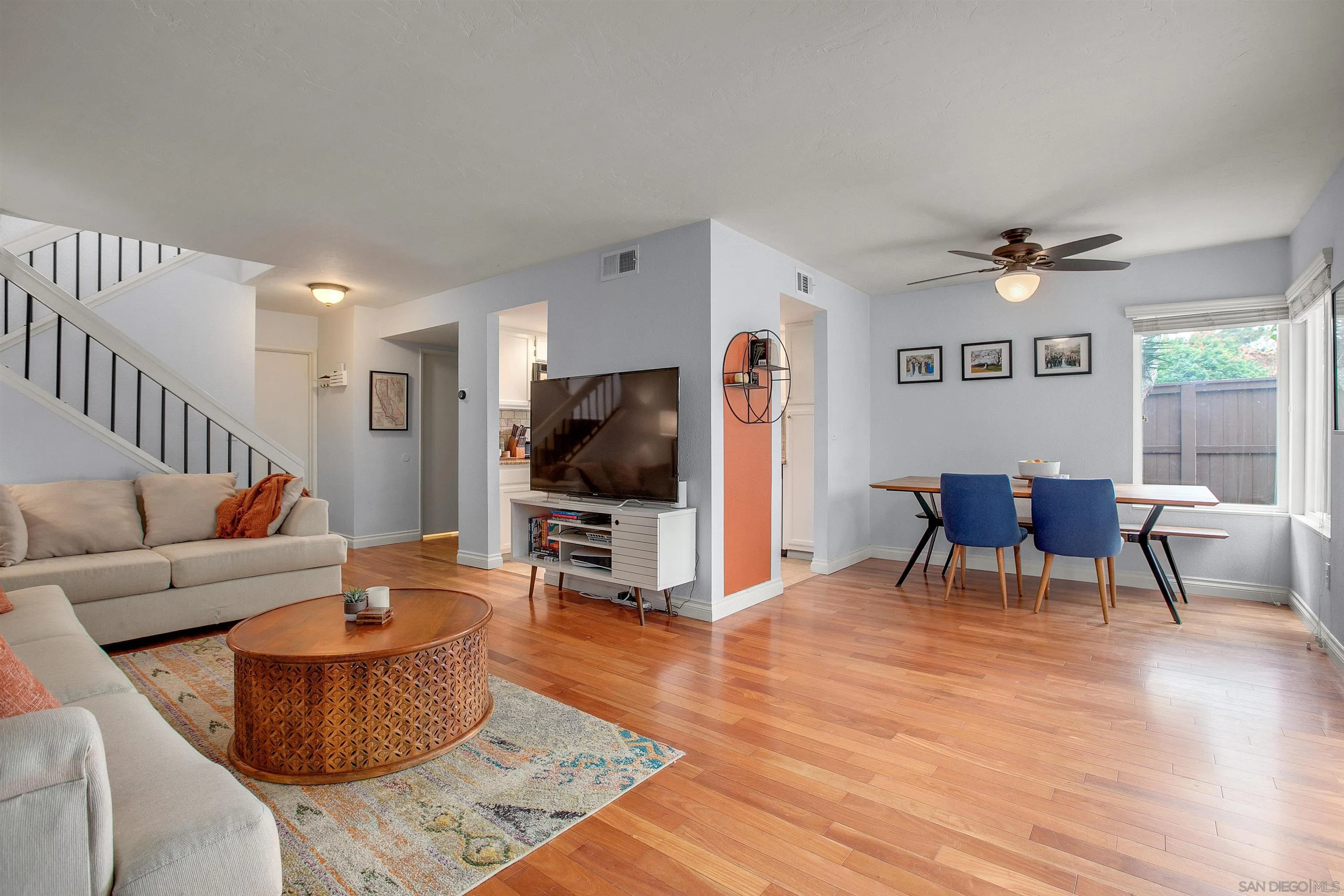 2952 Cape Cod Circle Carlsbad, CA 92010 - Photo 6 of 24 a living room with furniture and a flat screen tv