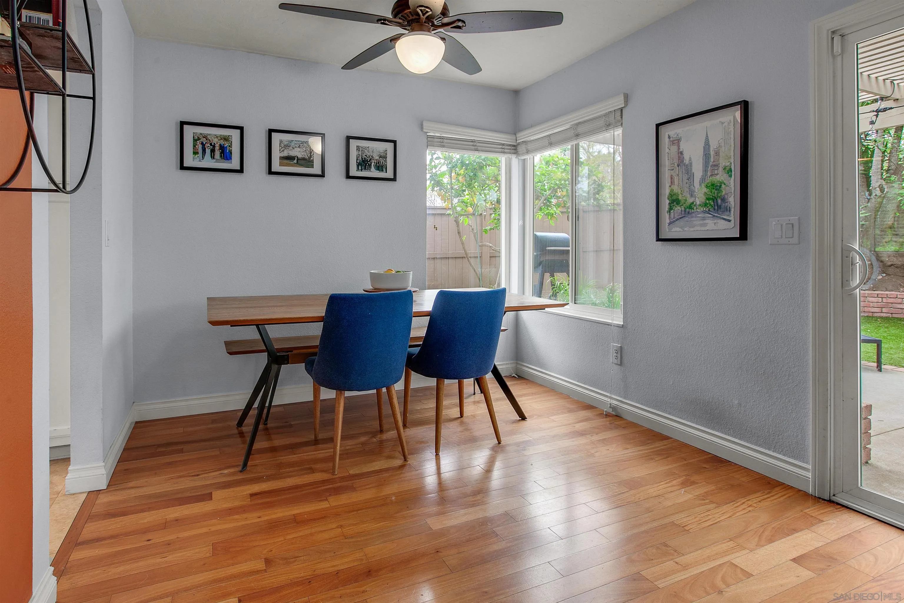 2952 Cape Cod Circle Carlsbad, CA 92010 - Photo 7 of 24 a view of a dining room with furniture window and wooden floor