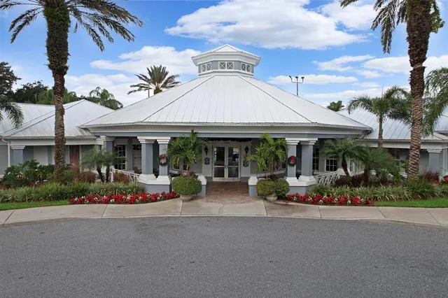 a room with lots of wooden furniture and a mirror
