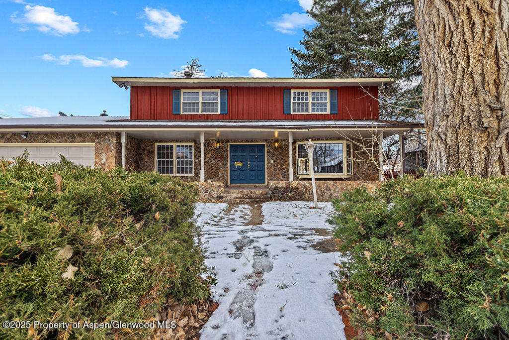 779 Taylor Street Craig, CO 81625 - Photo 2 of 84 front view of a house with a yard